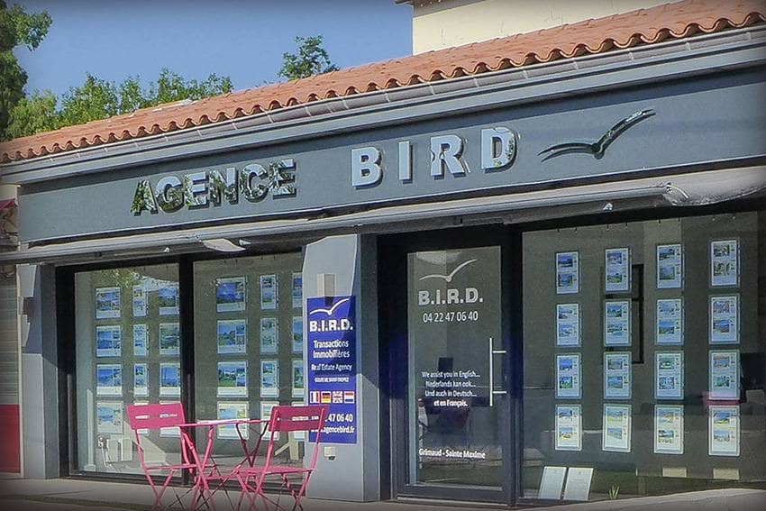 enseigne commerciale sans éclairage en inox - agence immobilière