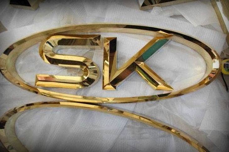 lettres prismatiques logo inox gold laison miroir