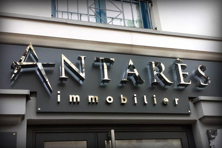 enseigne commerciale pour agence immobilière en inox miroir