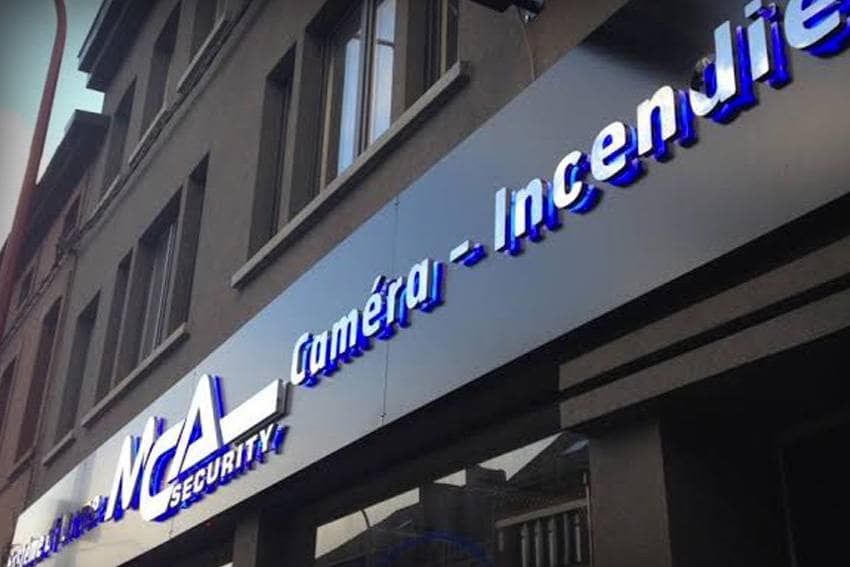 enseigne professionnelle en inox miroir