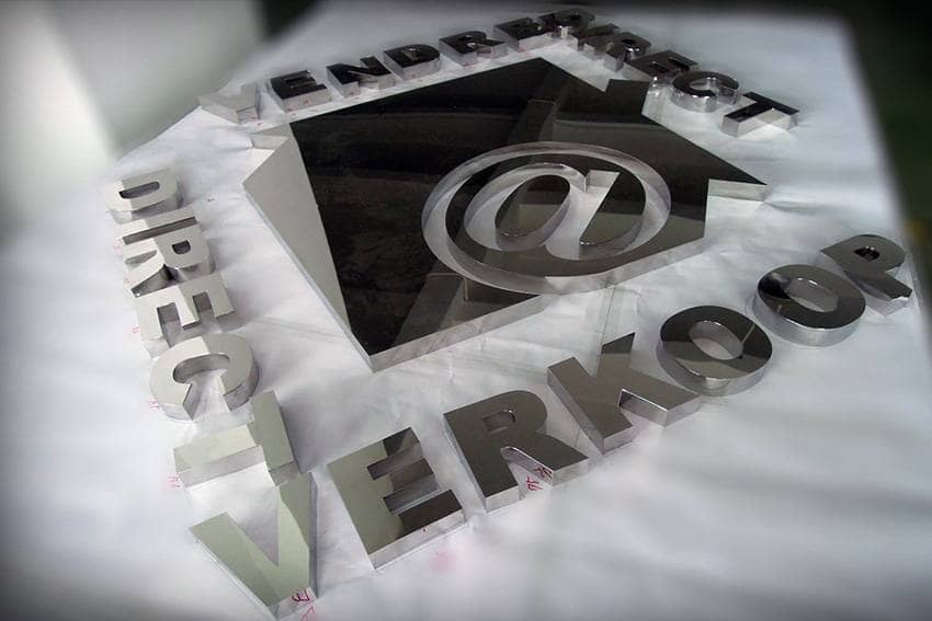 enseigne professionnelle en inox miroir