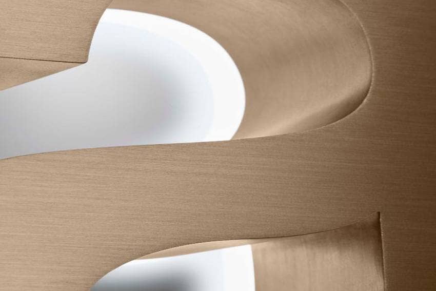lettrage bronze pour enseigne publicitaire en titanium bronze brossé