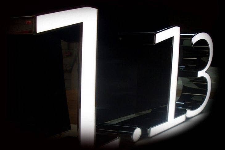 enseigne éclairage direct lettre boitier inox miroir face éclairée