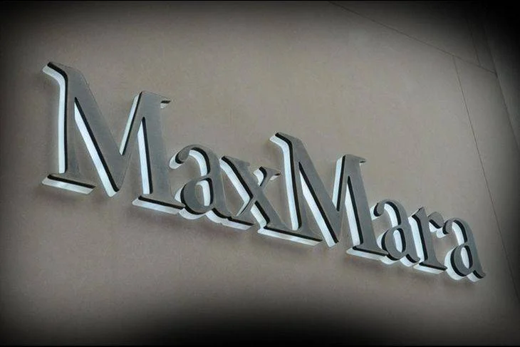 normes et réglementation des enseignes lumineuses - enseigne éclairage indirect lettrage plexiglass face inox brossé