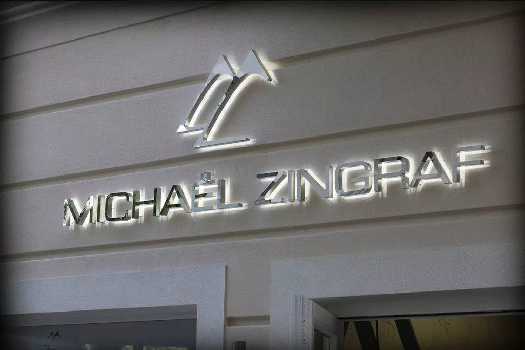 enseigne lumineuse lettres relief éclairage indirect inox 316